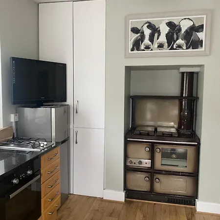 Carey's Bar & Kilkenny Border Apartamento *